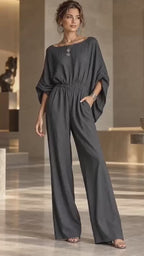 Luna damesjumpsuit met batwingmouwen | Pinky Posh Boutique